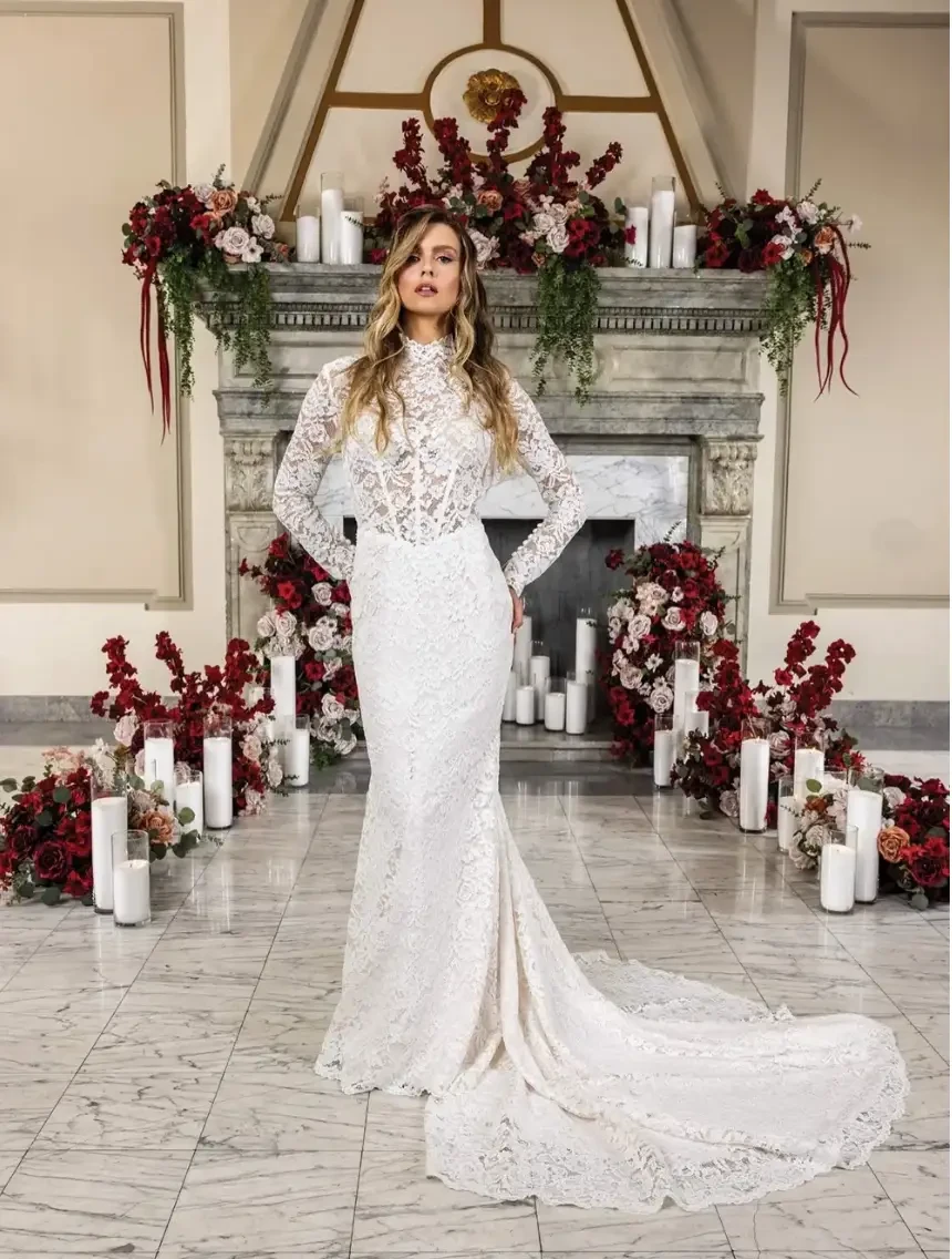 Сouple wearing a white gown and a white suit