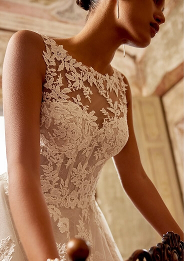 Model wearing a white bridal dress