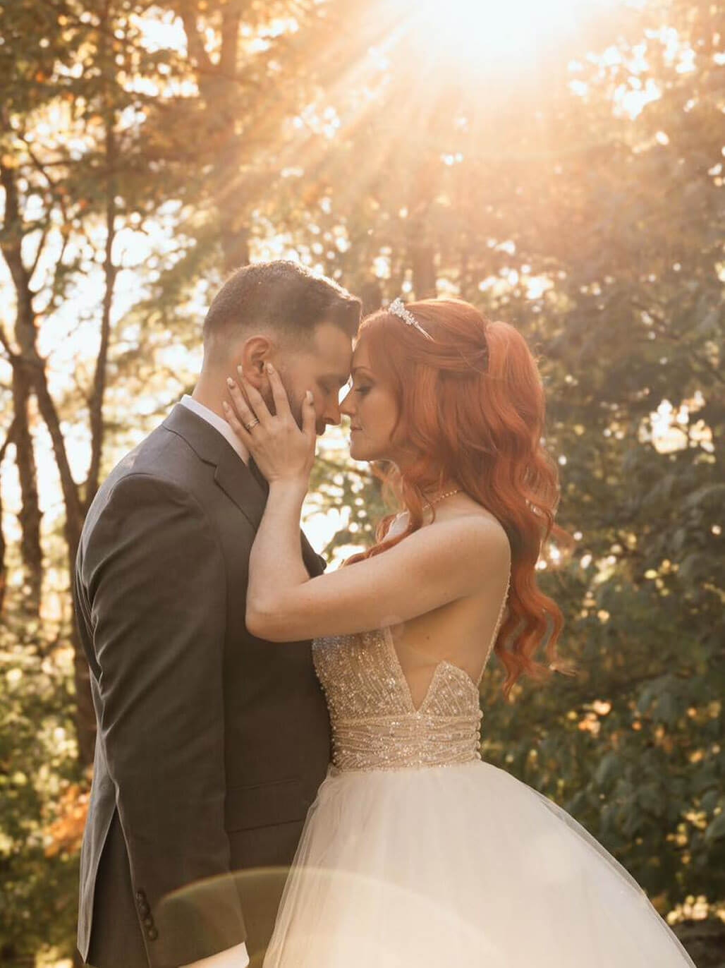 Сouple wearing a white gown and a white suit